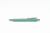 Light blue pen with a textured grip on a white background